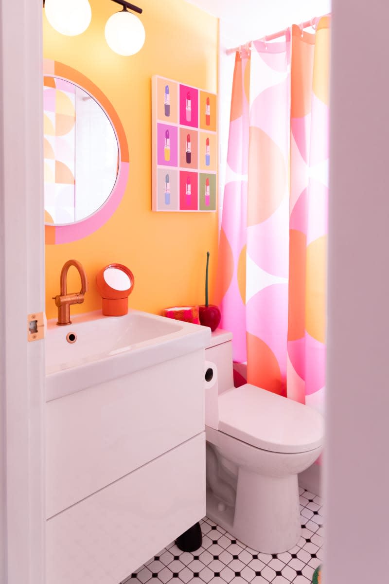 Colorful shower curtain in bathroom.