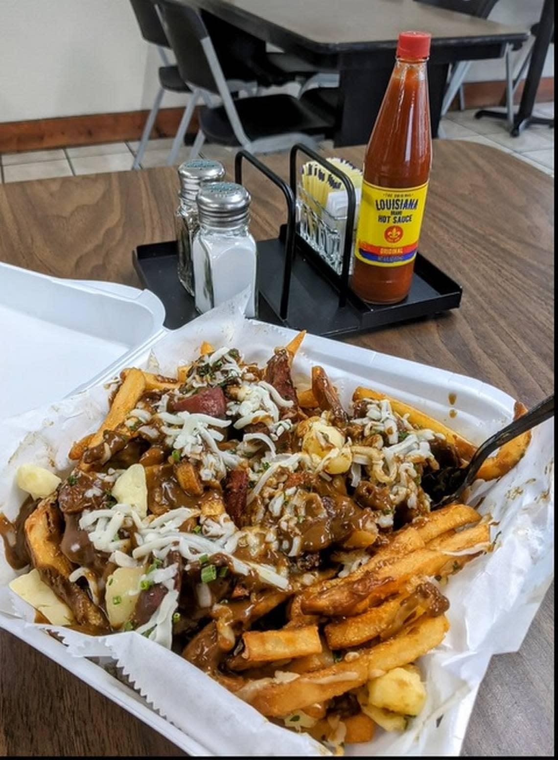 Cajun poutine is one of the menu items at the new LA-Cajun Seafood & Chicken restaurant near 21st and Woodlawn.