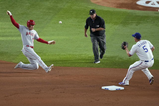 Seager triggers wild 8th as Rangers rally past Angels 10-5