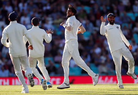 Cricket - England v India - Fifth Test - Kia Oval, London, Britain - September 7, 2018 India's Ishant Sharma (C) celebrates the wicket of England's Moeen Ali Action Images via Reuters/Paul Childs