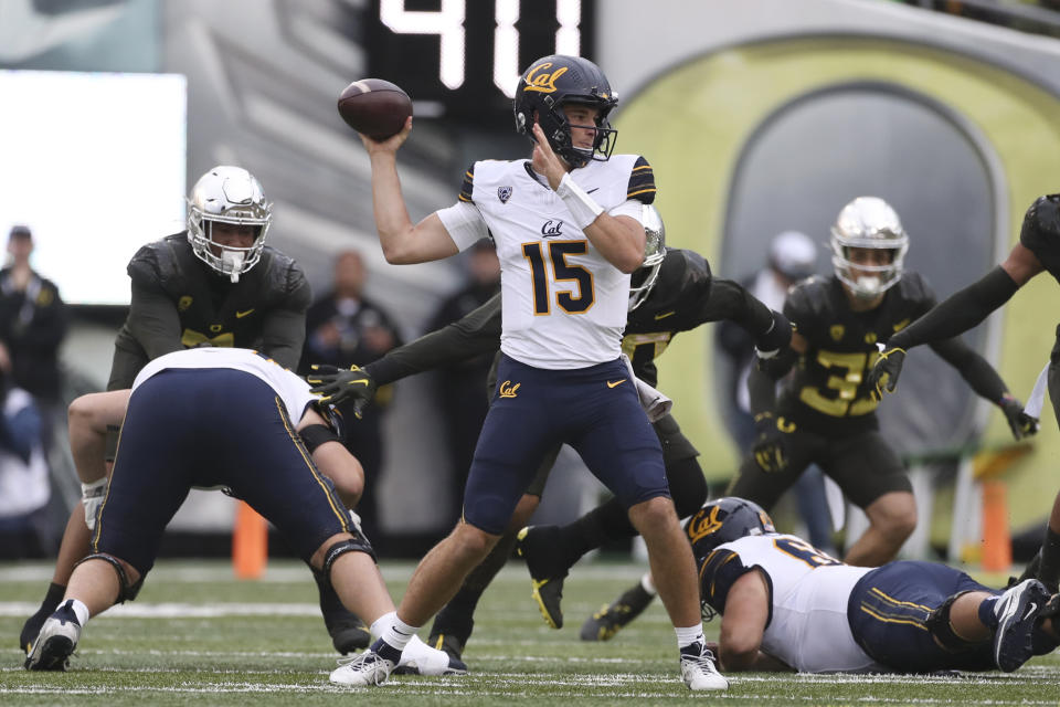 California quarterback Fernando Mendoza (15) looks to pass against Oregon during the first half of an NCAA football game, Saturday, Nov. 4, 2023, in Eugene, Ore. (AP Photo/Amanda Loman)