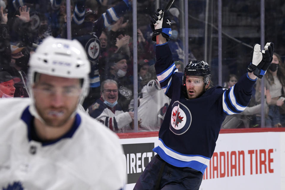 Winnipeg Jets' Evgeny Svechnikov (71) celebrates his goal against the Toronto Maple Leafs during the second period of NHL hockey game action in Winnipeg, Manitoba, Sunday, Dec. 5, 2021. (Fred Greenslade/The Canadian Press via AP)