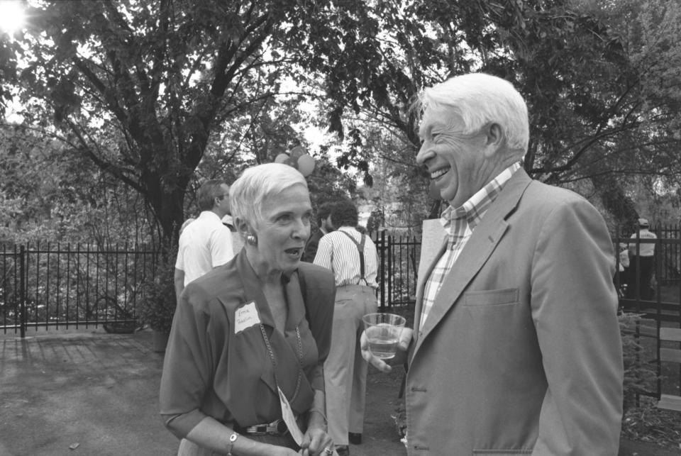 Ernestine Raclin chats with the late E. Blair Warner, a founding member of the Madison Center's board of directors, during the center's 40th anniversary celebration, "A Sunday in May on the Riverway in 1989."