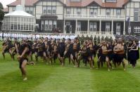 His father William was greeted with a traditional Maori challenge from fearsome-looking tattooed warriors in flax skirts wielding wooden spears, who threw a leaf at his feet as they issued a full-throated battle cry. (AP Photo/SNPA) NEW ZEALAND OUT