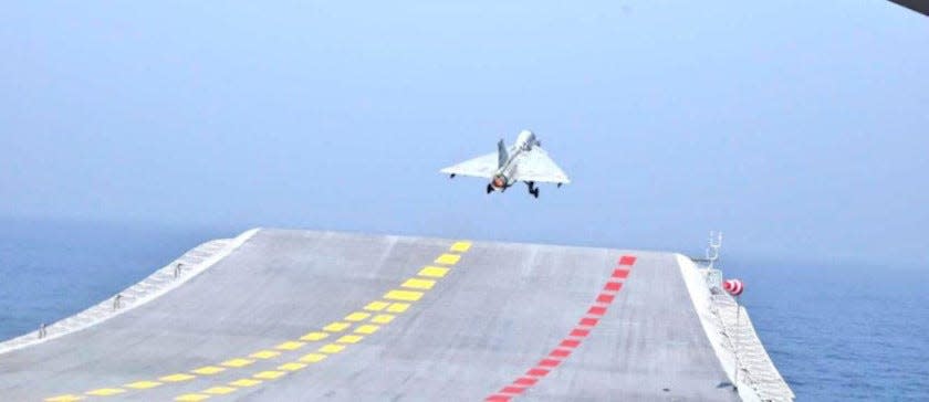 India navy aircraft carrier INS Vikrant Tejas fighter jet