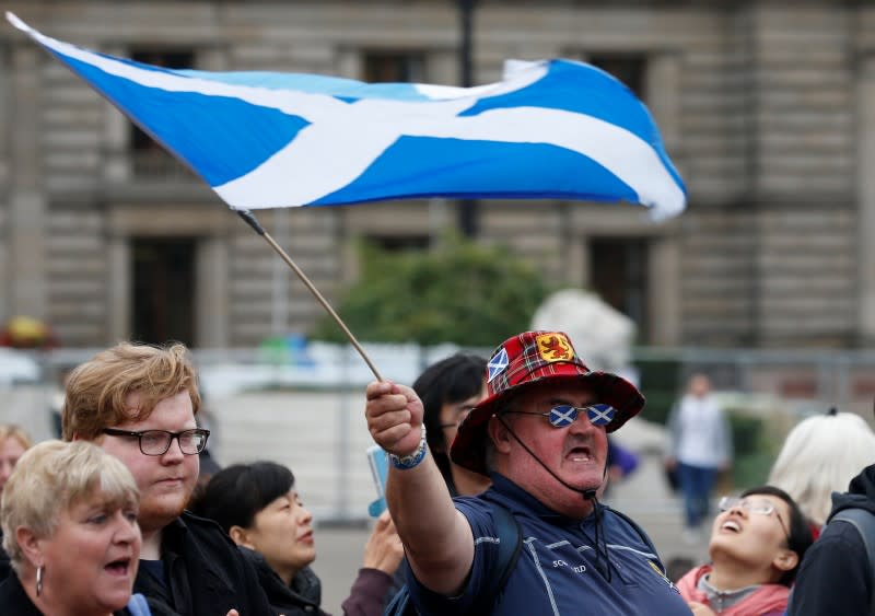 A supporter of the "Yes" campaign reacts in George Square after the referendum on Scottish independence in Glasgow, Scotland September 19, 2014. REUTERS/Cathal McNaughton/Files