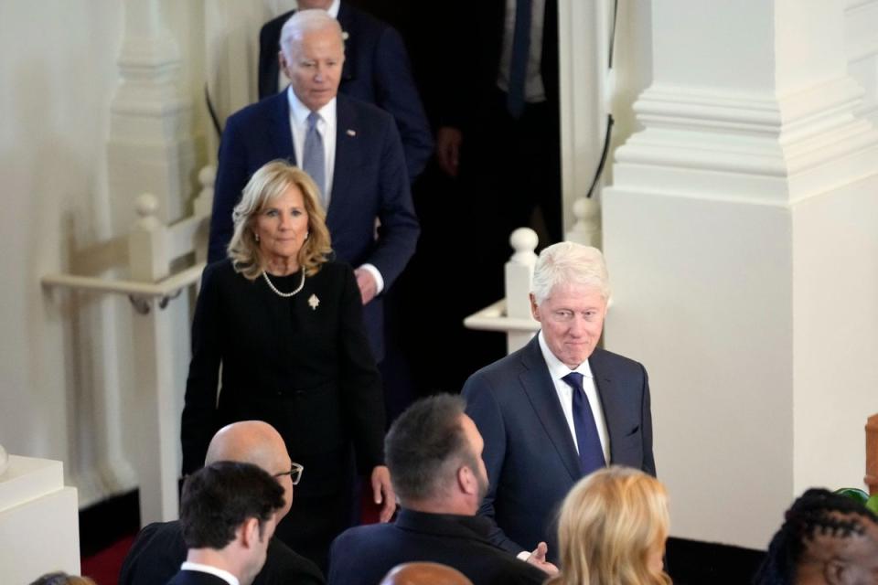 President Joe Biden, first lady Jill Biden and former President Bill Clinton arrive at the memorial (AP)