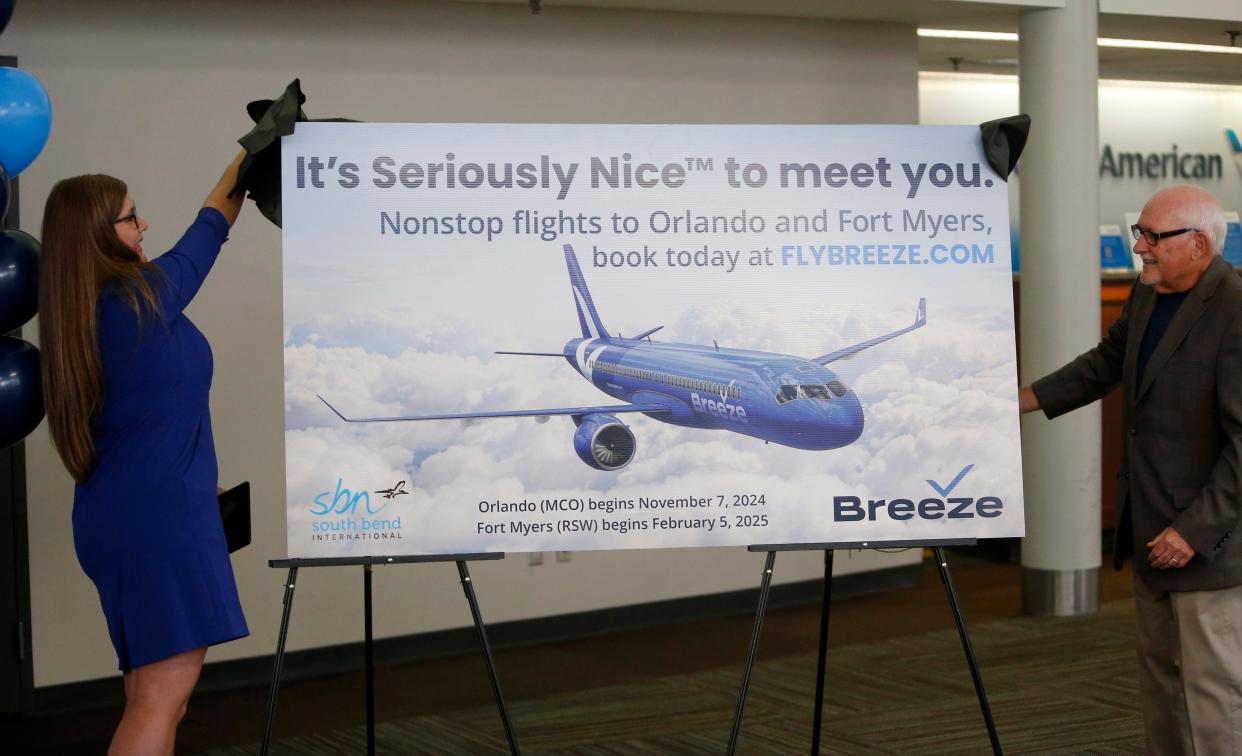 Breeze Airlines Chief Guest Officer Fiona Kiesel, left, and St. Joseph County Airport Authority Board President David Sage announce Wednesday, Aug. 7, 2024, that the airline will begin air service at South Bend International Airport with nonstop flights to Orlando on Nov. 5 and to Fort Myers on Feb. 5, 2025.