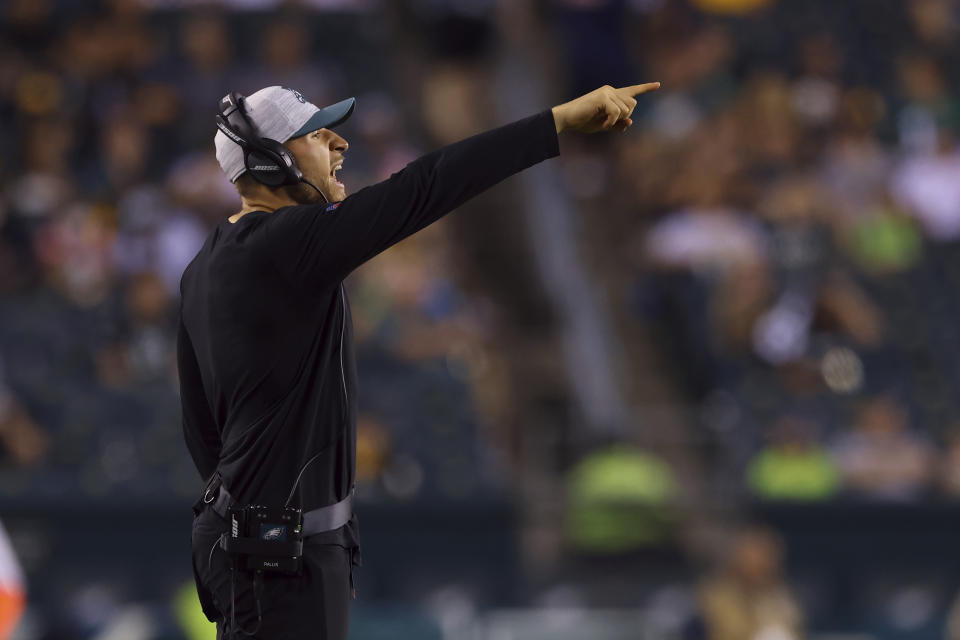 FILE - Philadelphia Eagles linebackers coach Nick Rallis gestures during a preseason NFL football game against the Pittsburgh Steelers, Thursday, Aug. 12, 2021, in Philadelphia. It's a big weekend for Nick Rallis and big brother Mike. Mike Rallis, better known as WWE star Madcap Moss, is in the mix for Saturday's Royal Rumble. (AP Photo/Rich Schultz, File)