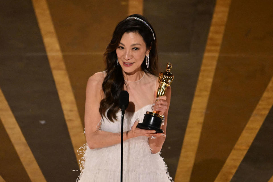 Michelle Yeoh accepts the Oscar for Best Actress in a Leading Role for "Everything Everywhere All at Once" onstage