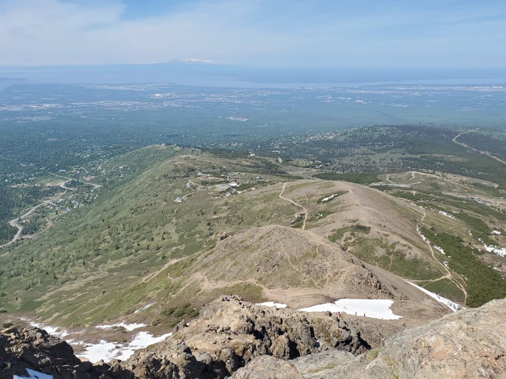 Braided trails created by crowds of hikers are seen on May 30, 2022, from the top of Flattop Mountain in Anchorage's Chugach State Park. (Photo by Yereth Rosen/Alaska Beacon)