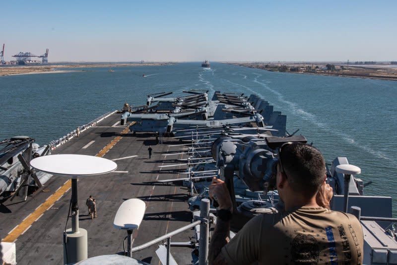 A U.S. Navy sailor from USS Bataan stands watch as the amphibious assault ship transits the Suez Canal with the 26th Marine Expeditionary Unit (MEU) on Sunday. Components of the Bataan Amphibious Ready Group and 26th MEU are deployed to the U.S. 5th Fleet area of operations to help ensure maritime security and stability in the Middle East region. Photo by Cpl. Nayelly Nieves-Nieves/U.S. Marine Corps/UPI