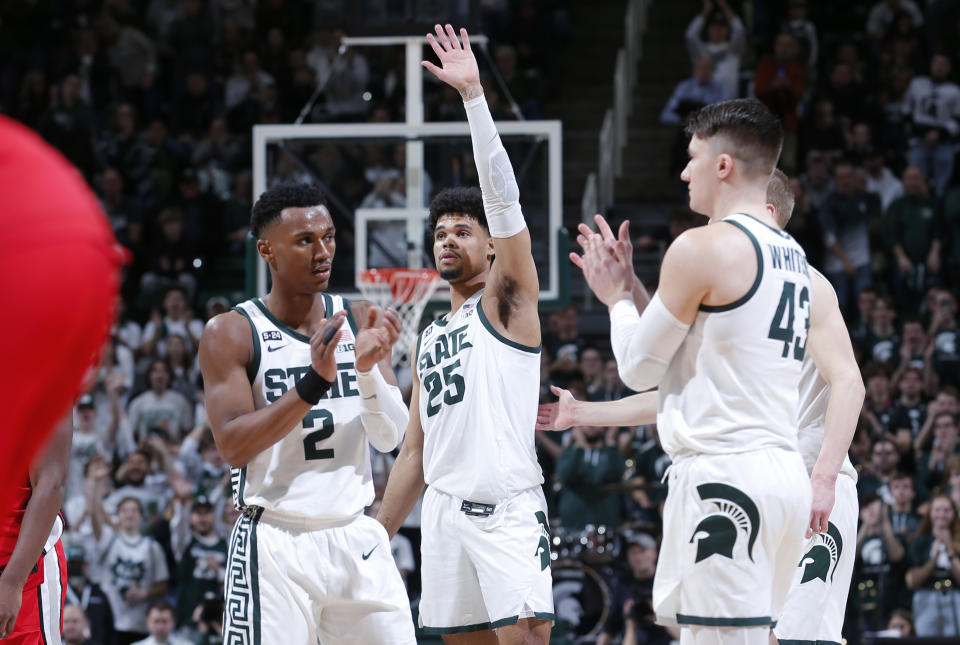Michigan State seniors, from left, Tyson Walker,, Malik Hall, Jason Whitens and Joey Hauser react near the conclusion of an NCAA college basketball game against Ohio State, Saturday, March 4, 2023, in East Lansing, Mich. (AP Photo/Al Goldis)