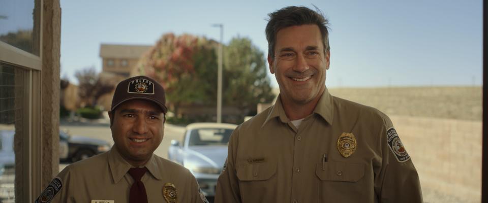 Nick Mohammed, left, and Jon Hamm star as police officers solving two murders in "Maggie Moore(s)."