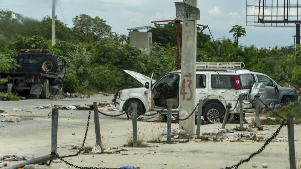 Abandoned cars on the road between the US Embassy and the Kraze Baryé stronghold in Port-au-Prince, Haiti, on April 28, 2024. - Evelio Contreras/CNN