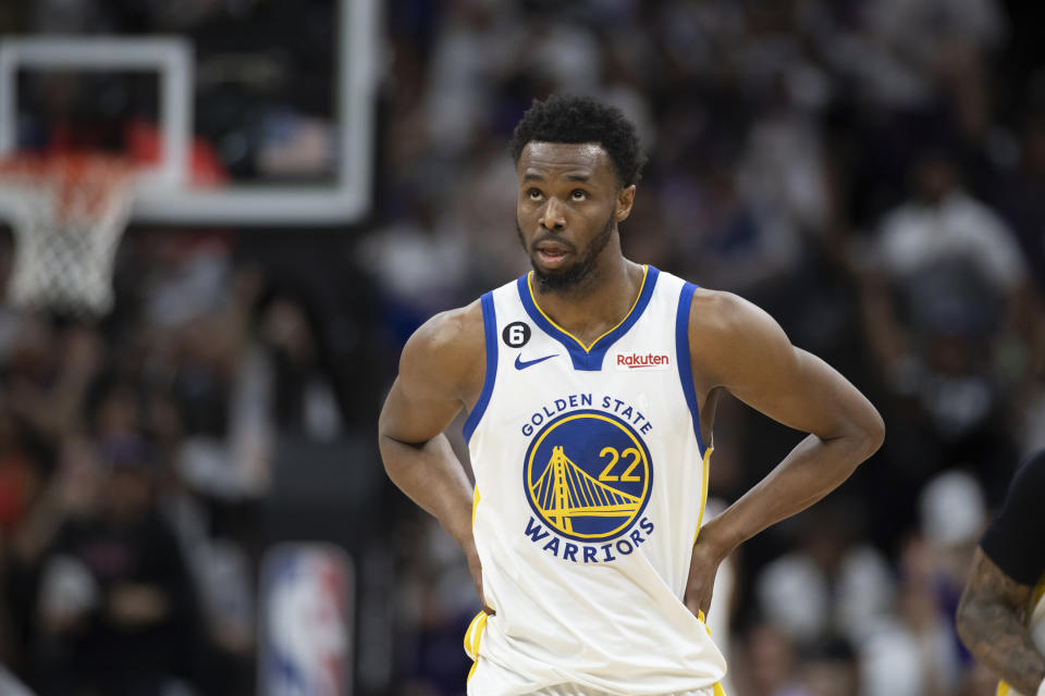 Golden State Warriors forward Andrew Wiggins (22) walks upcourt in the third quarter during Game 1 against the Sacramento Kings in the first round of the NBA basketball playoffs in Sacramento, Calif., Saturday, April 15, 2023. The Kings won 126 - 123. (AP Photo/José Luis Villegas)