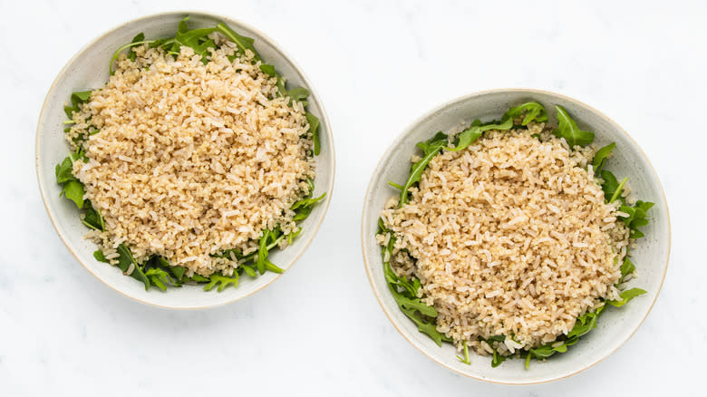 Arugula and grains in bowls