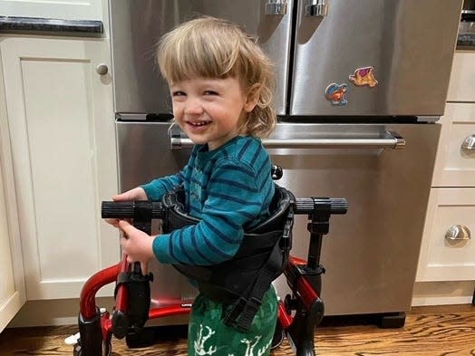 Three-year-old Henry Saladino with his walker