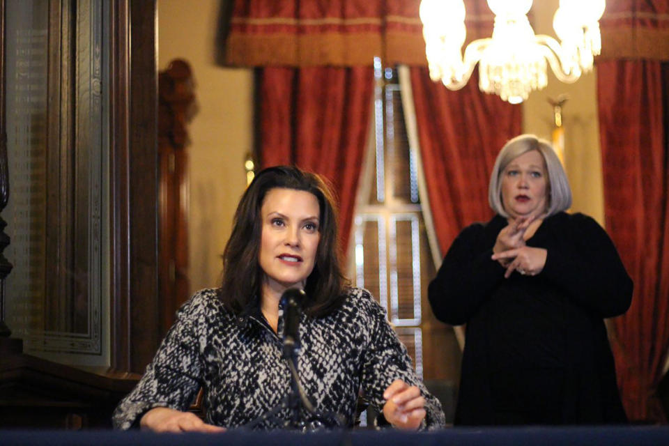 FILE - In this April 13, 2020 file photo, provided by the Michigan Office of the Governor, Michigan Gov. Gretchen Whitmer addresses the state during a speech in Lansing, Mich. Seven Midwestern governors announced Thursday, April 16, 2020 that they will coordinate on reopening their state economies amid the coronavirus pandemic, after similar pacts were made in the Northeast and on the West Coast. The latest agreement includes Illinois, Ohio, Michigan, Indiana, Wisconsin, Minnesota and Kentucky.(Michigan Office of the Governor via AP, Pool)