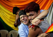 People belonging to the lesbian, gay, bisexual and transgender (LGBT) community celebrate after the Supreme Court's verdict of decriminalizing gay sex and revocation of the Section 377 law, at an NGO in Mumbai, India, September 6, 2018. REUTERS/Francis Mascarenhas