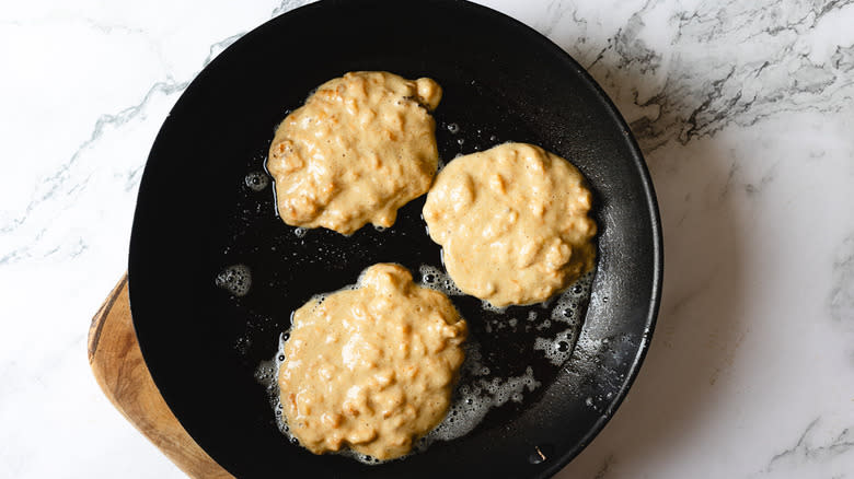 Three pancakes in pan