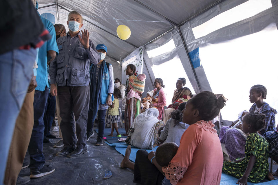 Filippo Grandi, U.N. High Commissioner for Refugees, visits Umm Rakouba refugee camp sheltering people who fled the conflict in Ethiopia's Tigray region in Qadarif, eastern Sudan, Saturday, Nov. 28, 2020. (AP Photo/Nariman El-Mofty)