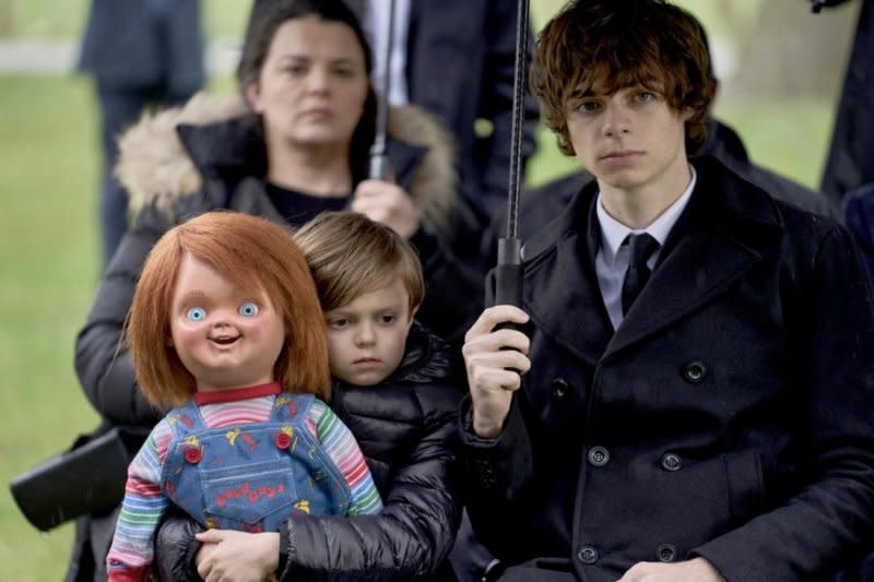 Left to right, Chucky, Callum Vinson and Jackson Kelly star in "Chucky." Photo courtesy of SYFY