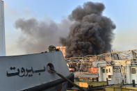 Smoke rises after a fire at a warehouse with explosives at the Port of Beirut led to massive blasts in Beirut, Lebanon on August 4, 2020. A large number of people were reportedly injured in the blasts, while former Prime Minister Saad al-Hariri -- who lives near the area of the explosions -- is said to be unharmed, according to initial reports. (Photo by Houssam Shbaro/Anadolu Agency via Getty Images)