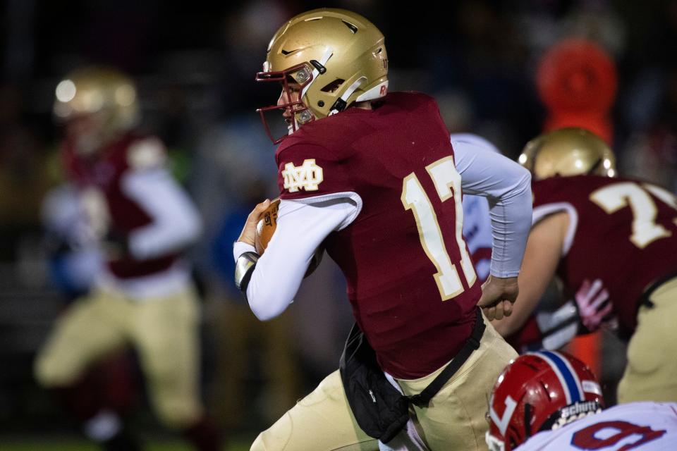 Mater Dei's Mason Wunderlich (17) runs the ball as the Mater Dei Wildcats play the Linton-Stockton Miners for the HSAA Class 2A semistate football championship at the Reitz Bowl in Evansville, Ind., Friday, Nov. 18, 2022. 