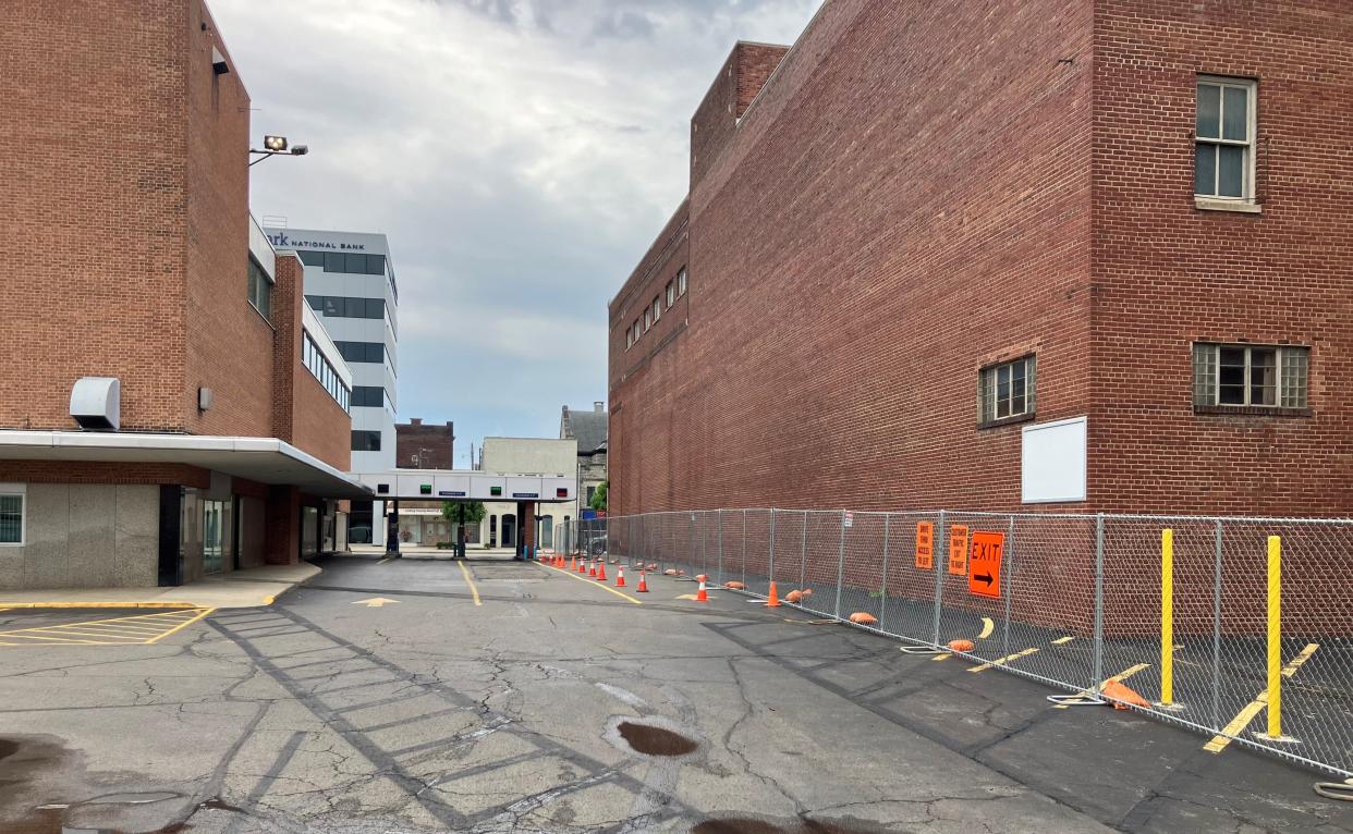 The drive-thru at Park National Bank in downtown Newark remains open, but will close temporarily at some point during the demolition of the adjacent John J. Carroll Building.