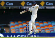 Cricket - Ashes test match - Australia v England - GABBA Ground, Brisbane, Australia, November 23, 2017. England's James Vince hits a boundary during the first day of the first Ashes cricket test match. REUTERS/David Gray