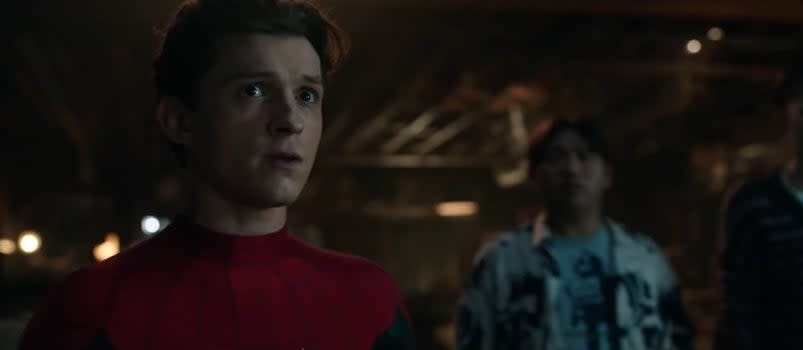 Peter in his Spider-Man suit next to Ned in "Spider-Man: No Way Home"