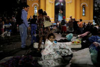 <p>A girl from a homeless family, that was living in the building that caught on fire, sits on her mattress donated by well-wishers in front of a church at Largo do Paissandu Square in Sao Paulo, Brazil, May 2, 2018. (Photo: Nacho Doce/Reuters) </p>