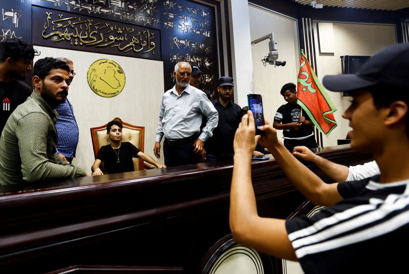 Supporters of Iraqi Shi'ite cleric Moqtada al-Sadr gather during a sit-in, inside the parliament building amid political crises in Baghdad,