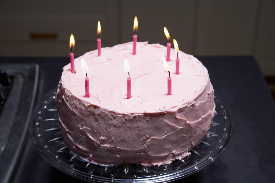 A cake with birthday candles in it.