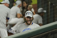 Los Angeles Dodgers starting pitcher Clayton Kershaw celebrates near the family area after winning Game 7 of a baseball National League Championship Series against the Atlanta Braves Sunday, Oct. 18, 2020, in Arlington, Texas. (AP Photo/Eric Gay)