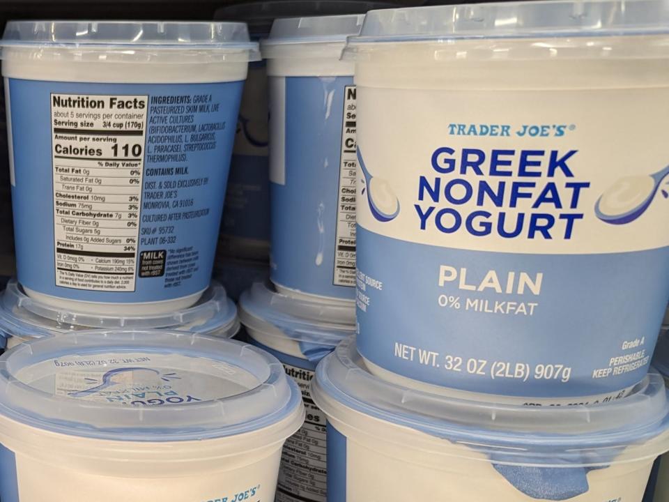 Containers of Trader Joe's plain Greek nonfat yogurt.  