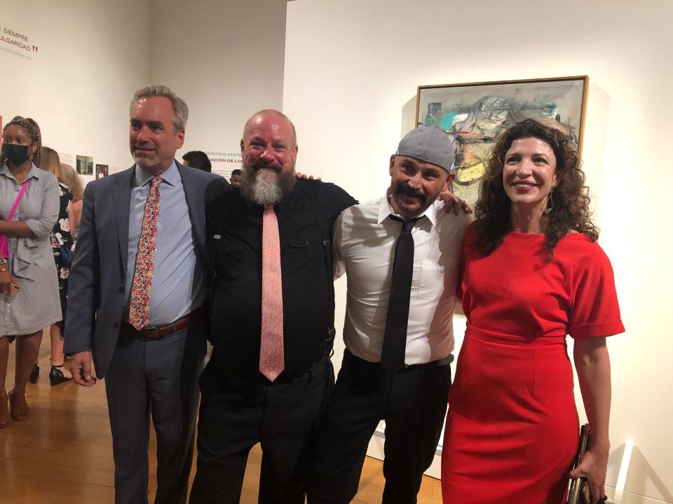 From left, Andy Schulz, vice president of the Arts and Dean of the College of Fine Arts at the University of Arizona, David Van Auker, Buck Burns, Olivia Miller, curator of University of Arizona Museum of Art, at a private viewing of "Woman-Ochre" on June 10, 2022 at the Getty Museum in Los Angeles. Van Auker and Burns are the ones who found the de Kooning in an estate sale and returned it to the museum after discovering it was stolen.