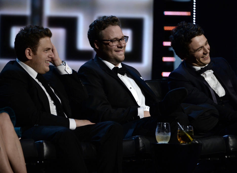 CULVER CITY, CA - AUGUST 25:  (L-R) Actor Jonah Hill, roast master Seth Rogen and roastee James Franco onstage during The Comedy Central Roast of James Franco at Culver Studios on August 25, 2013 in Culver City, California. The Comedy Central Roast Of James Franco will air on September 2 at 10:00 p.m. ET/PT.  (Photo by Kevin Winter/Getty Images for Comedy Central)