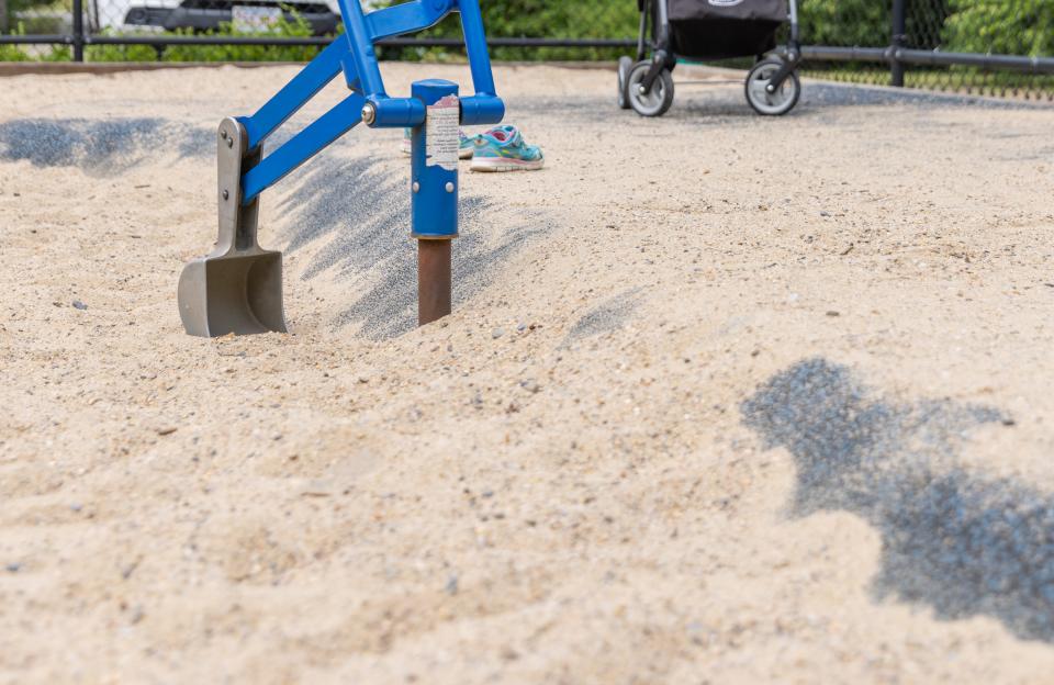 On the playground there is not as much sand as there should be.