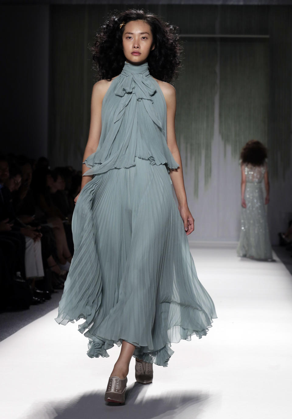 The Jenny Packham Spring 2014 collection is modeled during Fashion Week in New York, Tuesday, Sept. 10, 2013. (AP Photo/Richard Drew)