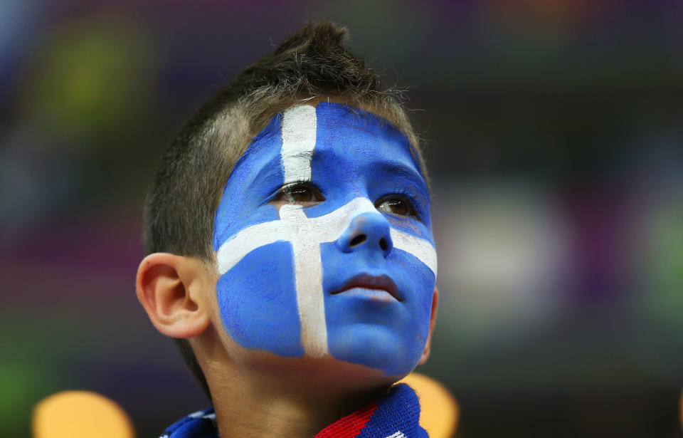 WARSAW, POLAND - JUNE 16: A Greece fan enjoys the atmosphere ahead of the UEFA EURO 2012 group A match between Greece and Russia at The National Stadium on June 16, 2012 in Warsaw, Poland. (Photo by Shaun Botterill/Getty Images)