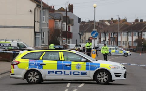 Police at the scene where the two women were shot dead at a house in St Leonards, East Sussex - Credit: Gareth Fuller/PA