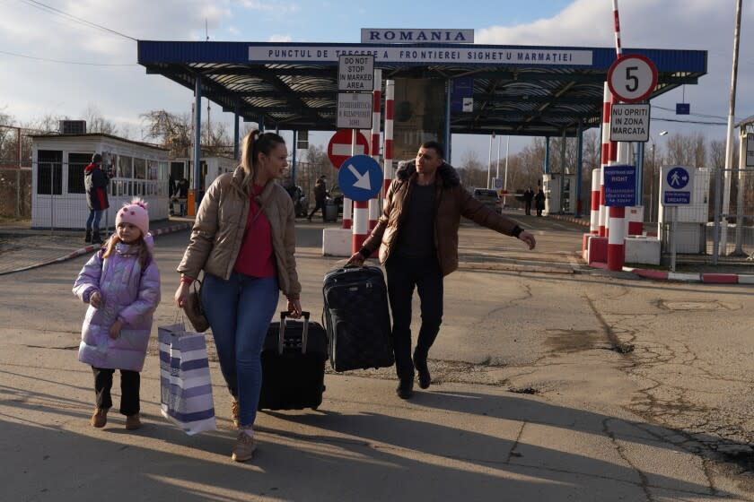 SIGHETU MARMATIEI, ROMANIA - FEBRUARY 24: People enter Romania, after having crossed from Ukraine, on February 24, 2022 in Sighetu Marmatiei, Romania. Overnight, Russia began a large-scale attack on Ukraine, with explosions reported in multiple cities and far outside the restive eastern regions held by Russian-backed rebels." (Photo by Andreea Campeanu/Getty Images)