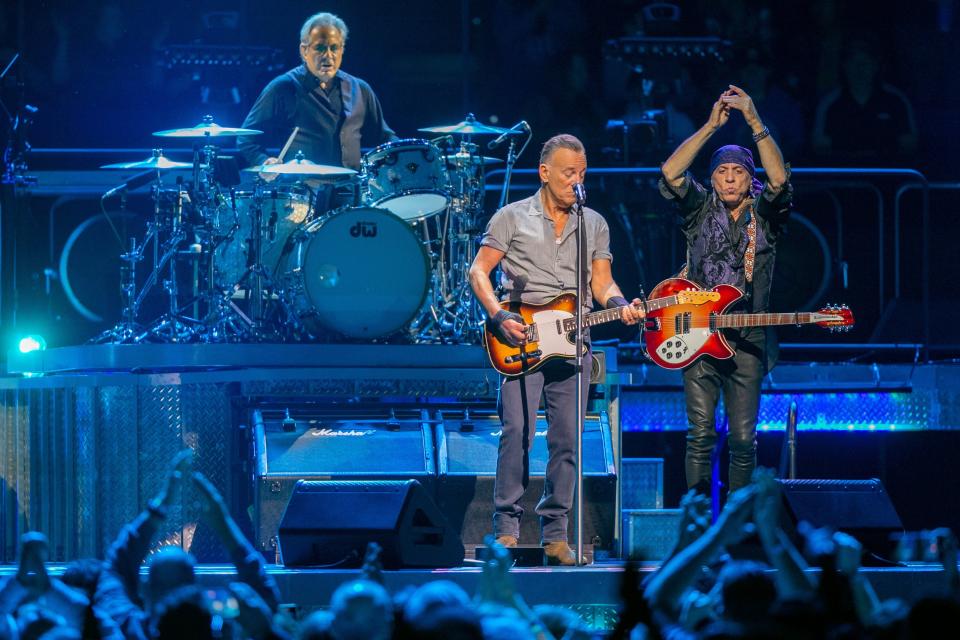 Bruce Springsteen plays the guitar and sings with Steven Van Zandt, right, as Max Weinberg plays the drums as they perform with the E Street Band at the BOK Center on Tuesday, February 21, 2023, in Tulsa, Okla.