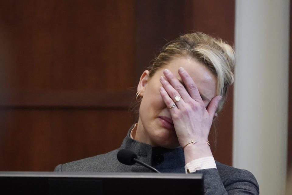 Actor Amber Heard testifies in the courtroom at the Fairfax County Circuit Courthouse in Fairfax, Va., Monday, May 16, 2022. Actor Johnny Depp sued his ex-wife Amber Heard for libel in Fairfax County Circuit Court after she wrote an op-ed piece in The Washington Post in 2018 referring to herself as a "public figure representing domestic abuse." (AP Photo/Steve Helber, Pool)