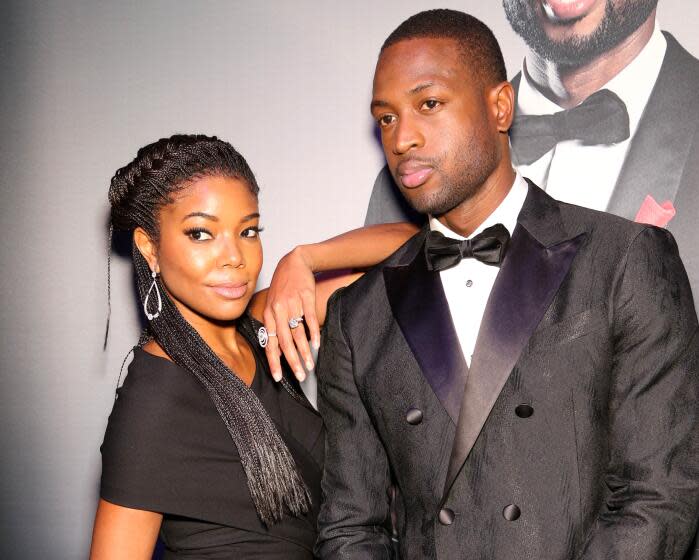 Gabrielle Union and Dwyane Wade arrive during the RunWade Fashion Show on Saturday, Nov. 14, 2015 in Miami, Fla. (Photo by Omar Vega/Invision/AP)