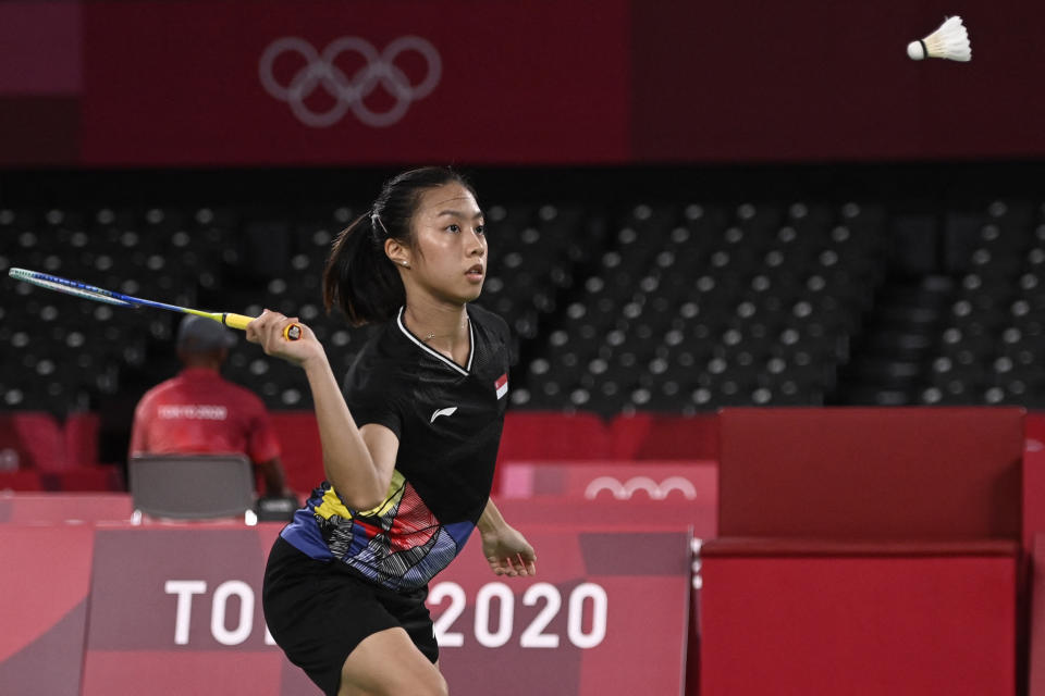 Singapore shuttler Yeo Jia Min hits a shot to Mexico's Haramara Gaitan in their women's singles badminton group stage match during the 2020 Tokyo Olympics.