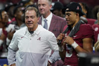 Alabama head coach Nick Saban and Alabama quarterback Bryce Young celebrate the teams win after the Southeastern Conference championship NCAA college football game between Georgia and Alabama, Saturday, Dec. 4, 2021, in Atlanta. Alabama won 41-24. (AP Photo/Brynn Anderson)