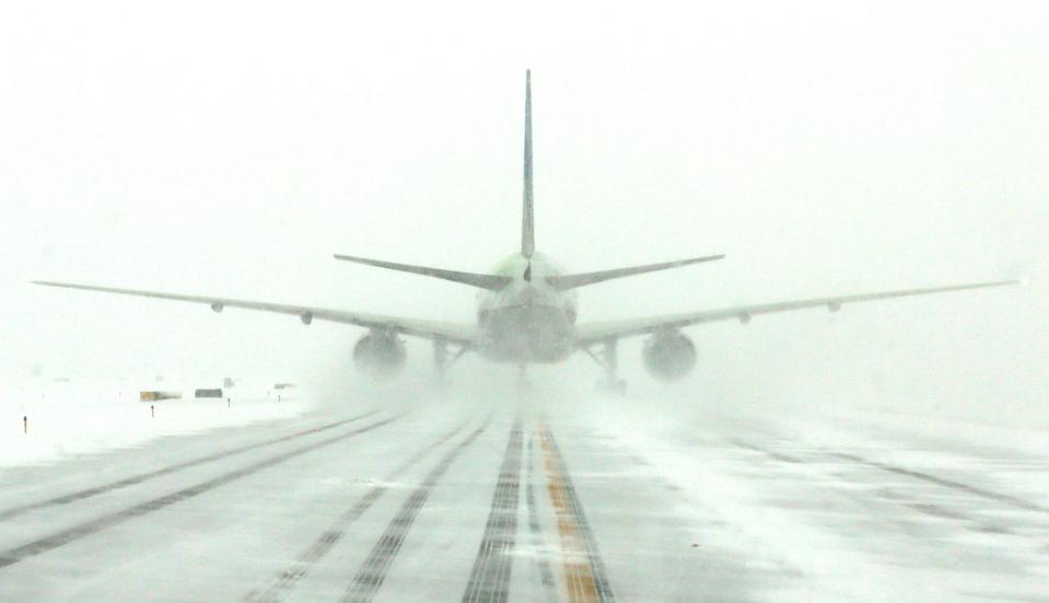 Snow from Wednesday and Thursday is snarling airport traffic on the East Coast.